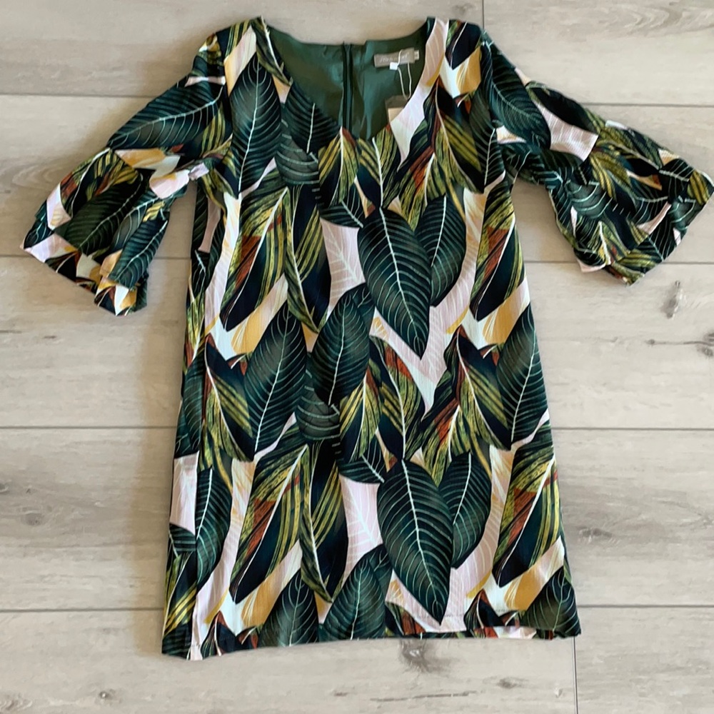 Women dress with v-neck and bell sleeve.